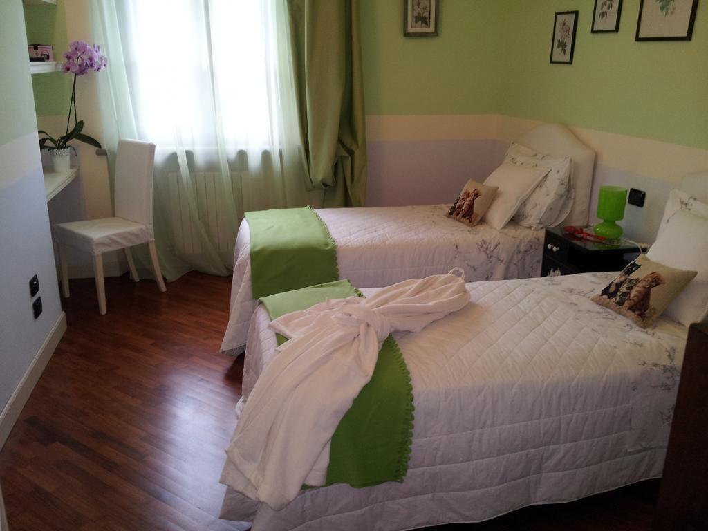 Il Campano Apartment กอลโลดี ห้อง รูปภาพ